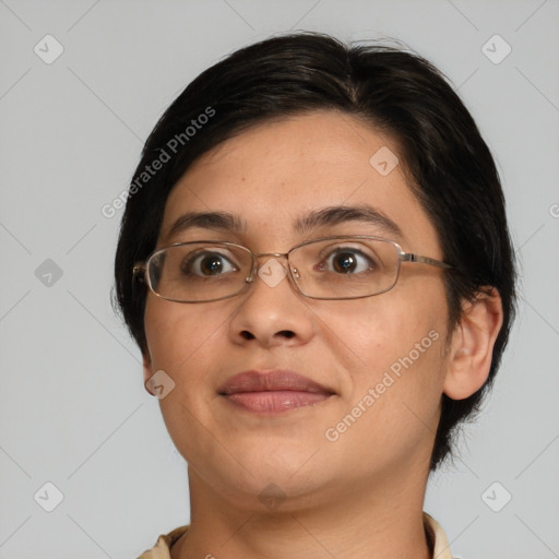 Joyful white adult female with medium  brown hair and brown eyes