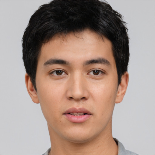 Neutral asian young-adult male with short  black hair and brown eyes