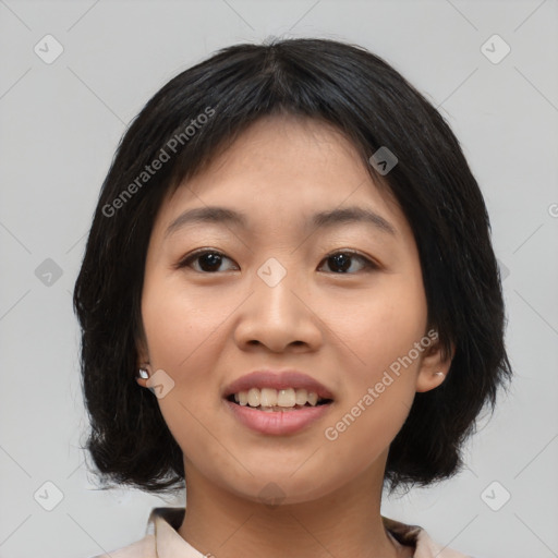 Joyful asian young-adult female with medium  black hair and brown eyes