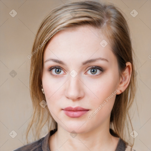 Neutral white young-adult female with medium  brown hair and grey eyes