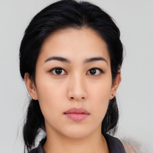Neutral asian young-adult female with medium  black hair and brown eyes