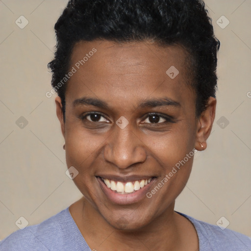 Joyful black young-adult male with short  brown hair and brown eyes