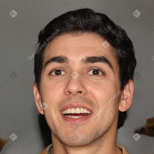 Joyful white young-adult male with short  black hair and brown eyes