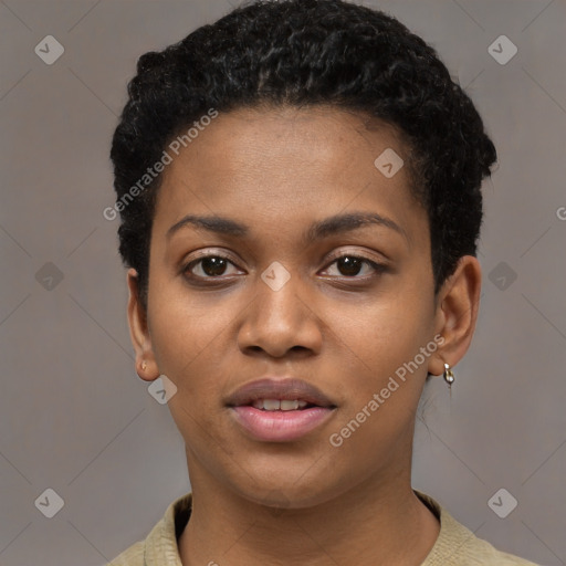 Joyful black young-adult female with short  black hair and brown eyes