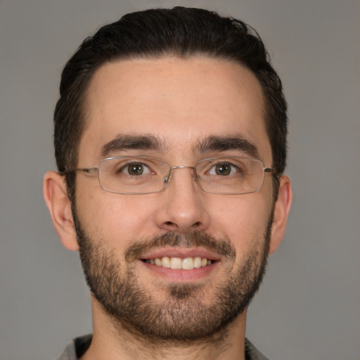 Joyful white young-adult male with short  brown hair and brown eyes