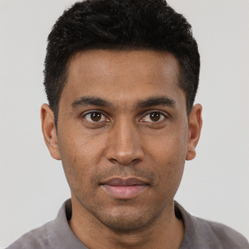 Neutral black young-adult male with short  black hair and brown eyes