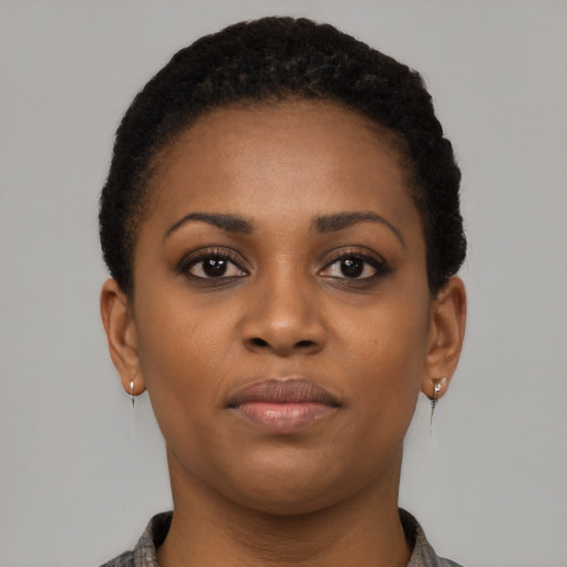 Neutral black young-adult female with short  brown hair and brown eyes