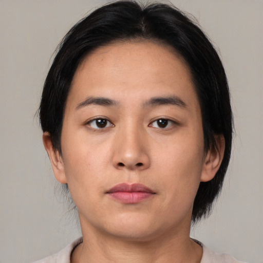 Neutral asian young-adult female with medium  black hair and brown eyes