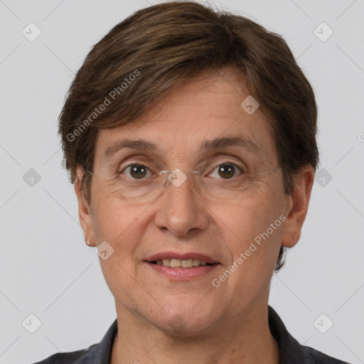 Joyful white adult female with short  brown hair and grey eyes