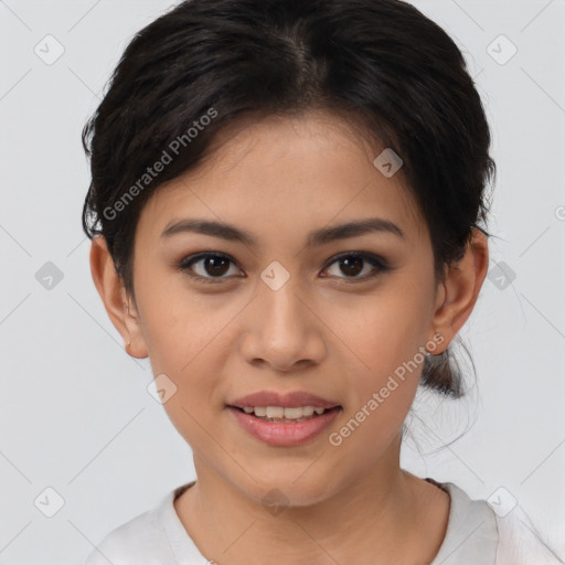 Joyful asian young-adult female with short  brown hair and brown eyes