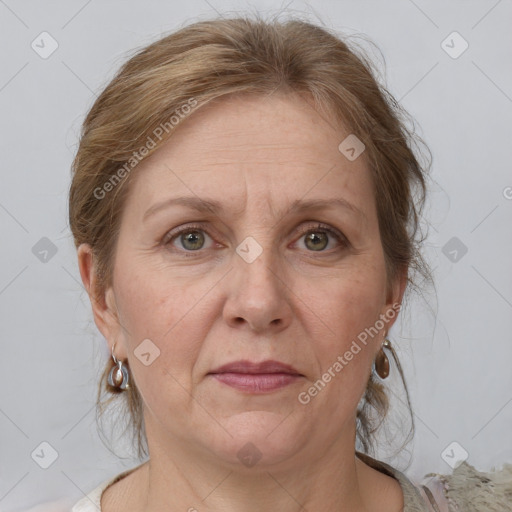 Joyful white adult female with medium  brown hair and grey eyes