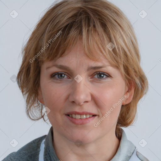 Joyful white young-adult female with medium  brown hair and blue eyes