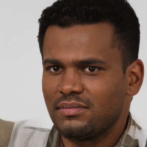 Neutral black young-adult male with short  black hair and brown eyes