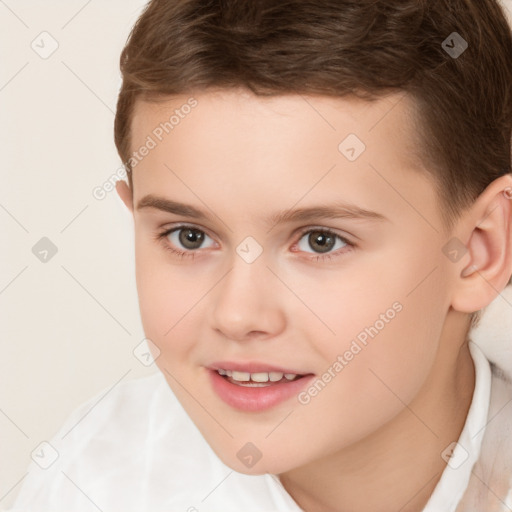 Joyful white child female with short  brown hair and brown eyes