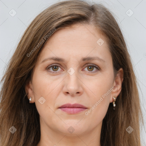 Joyful white adult female with long  brown hair and brown eyes