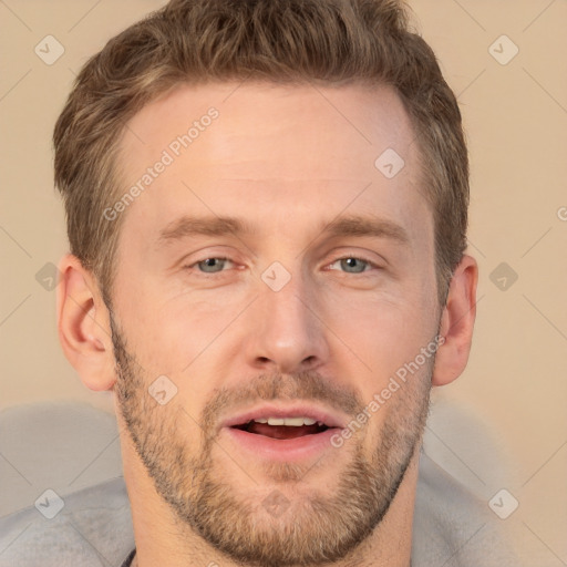 Joyful white adult male with short  brown hair and brown eyes