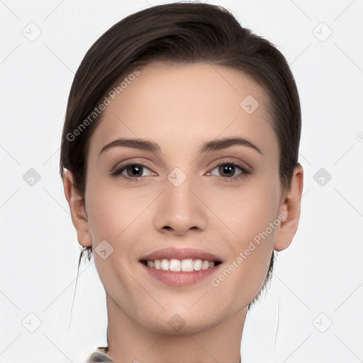 Joyful white young-adult female with short  black hair and brown eyes