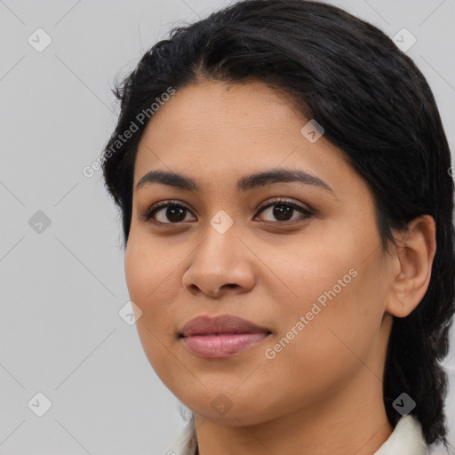 Joyful asian young-adult female with medium  black hair and brown eyes