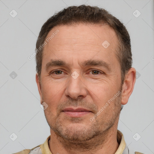 Neutral white adult male with short  brown hair and brown eyes