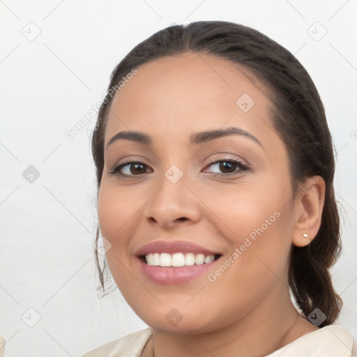 Joyful white young-adult female with long  black hair and brown eyes