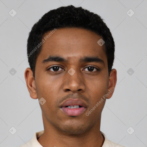 Neutral black young-adult male with short  black hair and brown eyes