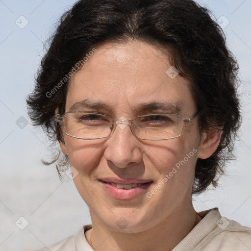 Joyful white middle-aged female with medium  brown hair and brown eyes