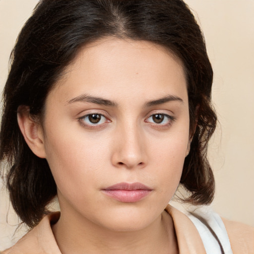 Neutral white young-adult female with medium  brown hair and brown eyes