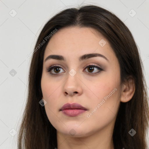 Neutral white young-adult female with long  brown hair and brown eyes