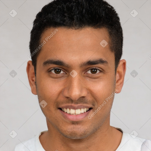 Joyful latino young-adult male with short  black hair and brown eyes