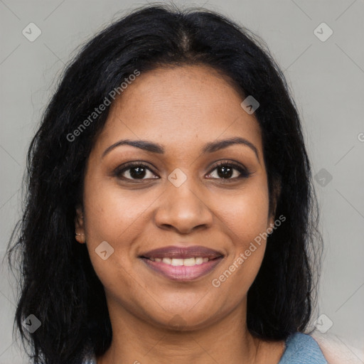 Joyful latino young-adult female with long  brown hair and brown eyes