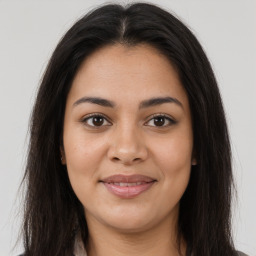 Joyful asian young-adult female with long  brown hair and brown eyes