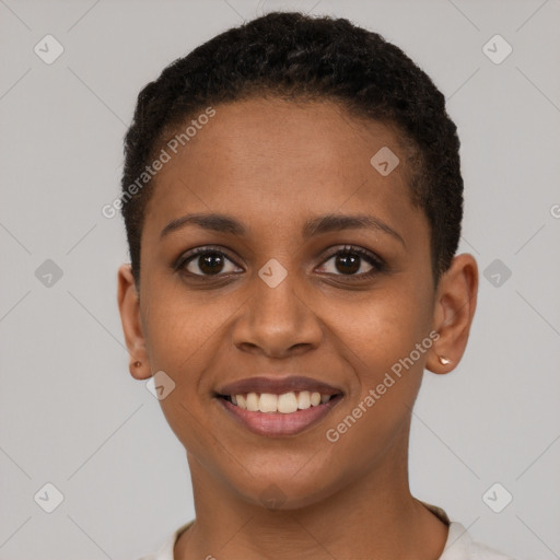 Joyful black young-adult female with short  brown hair and brown eyes