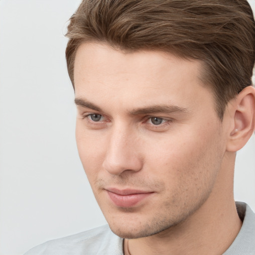 Neutral white young-adult male with short  brown hair and grey eyes