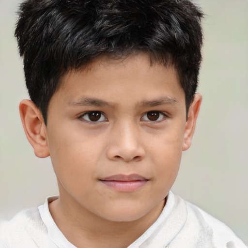 Joyful white child male with short  brown hair and brown eyes