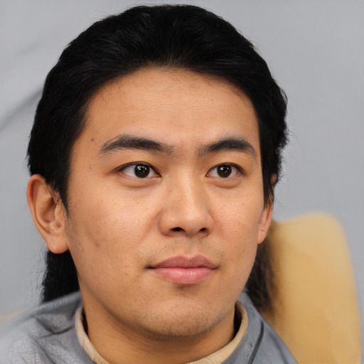 Neutral asian young-adult male with short  black hair and brown eyes