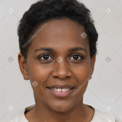 Joyful black young-adult female with short  brown hair and brown eyes