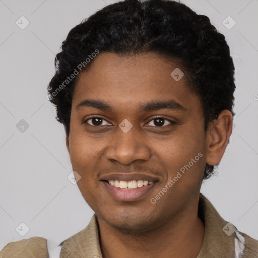 Joyful black young-adult male with short  black hair and brown eyes