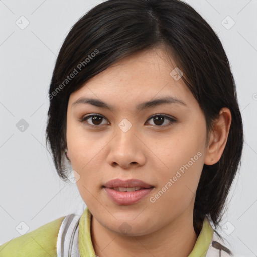 Joyful asian young-adult female with medium  brown hair and brown eyes