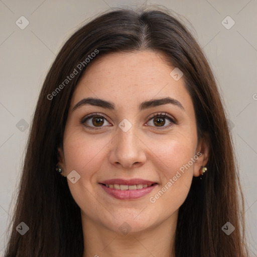 Joyful white young-adult female with long  brown hair and brown eyes