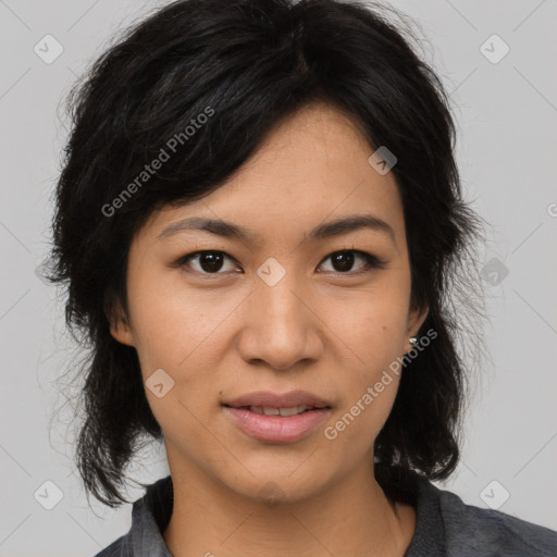 Joyful asian young-adult female with medium  black hair and brown eyes