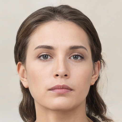 Neutral white young-adult female with medium  brown hair and brown eyes