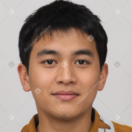 Joyful asian young-adult male with short  brown hair and brown eyes