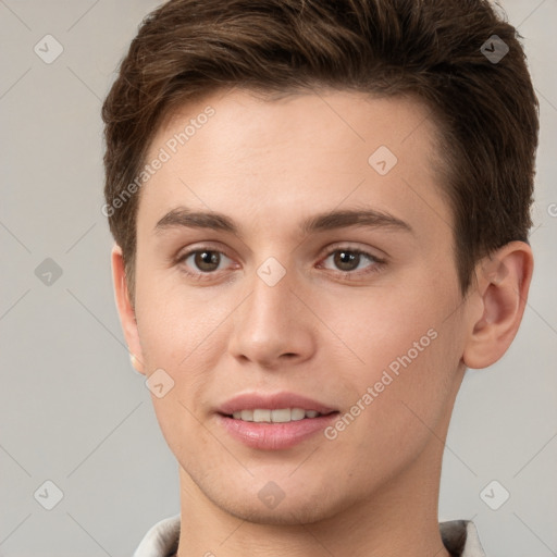 Joyful white young-adult female with short  brown hair and grey eyes