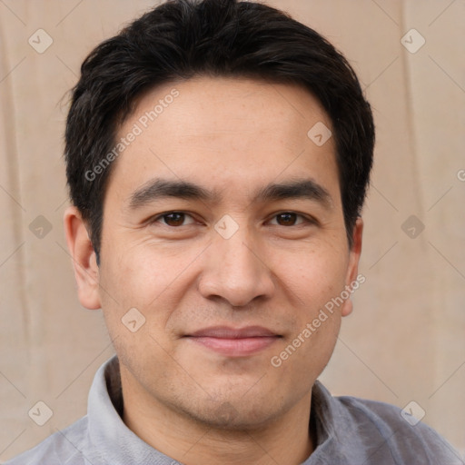 Joyful white young-adult male with short  black hair and brown eyes