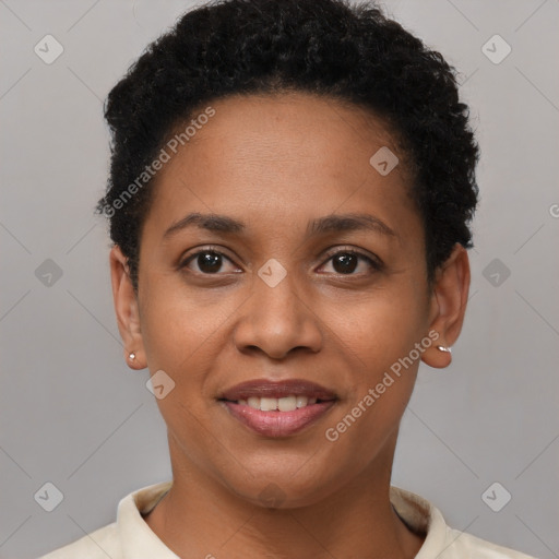 Joyful black young-adult female with short  brown hair and brown eyes