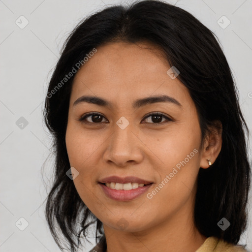 Joyful asian young-adult female with long  brown hair and brown eyes