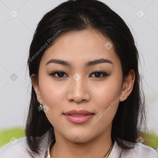 Joyful asian young-adult female with medium  brown hair and brown eyes