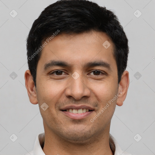 Joyful latino young-adult male with short  black hair and brown eyes