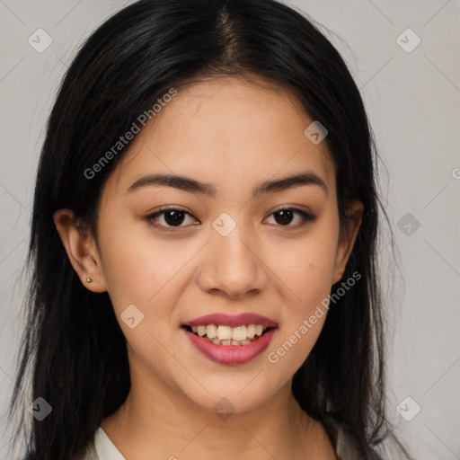 Joyful latino young-adult female with long  brown hair and brown eyes