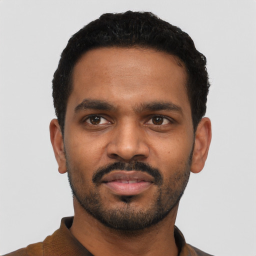 Neutral black young-adult male with short  black hair and brown eyes